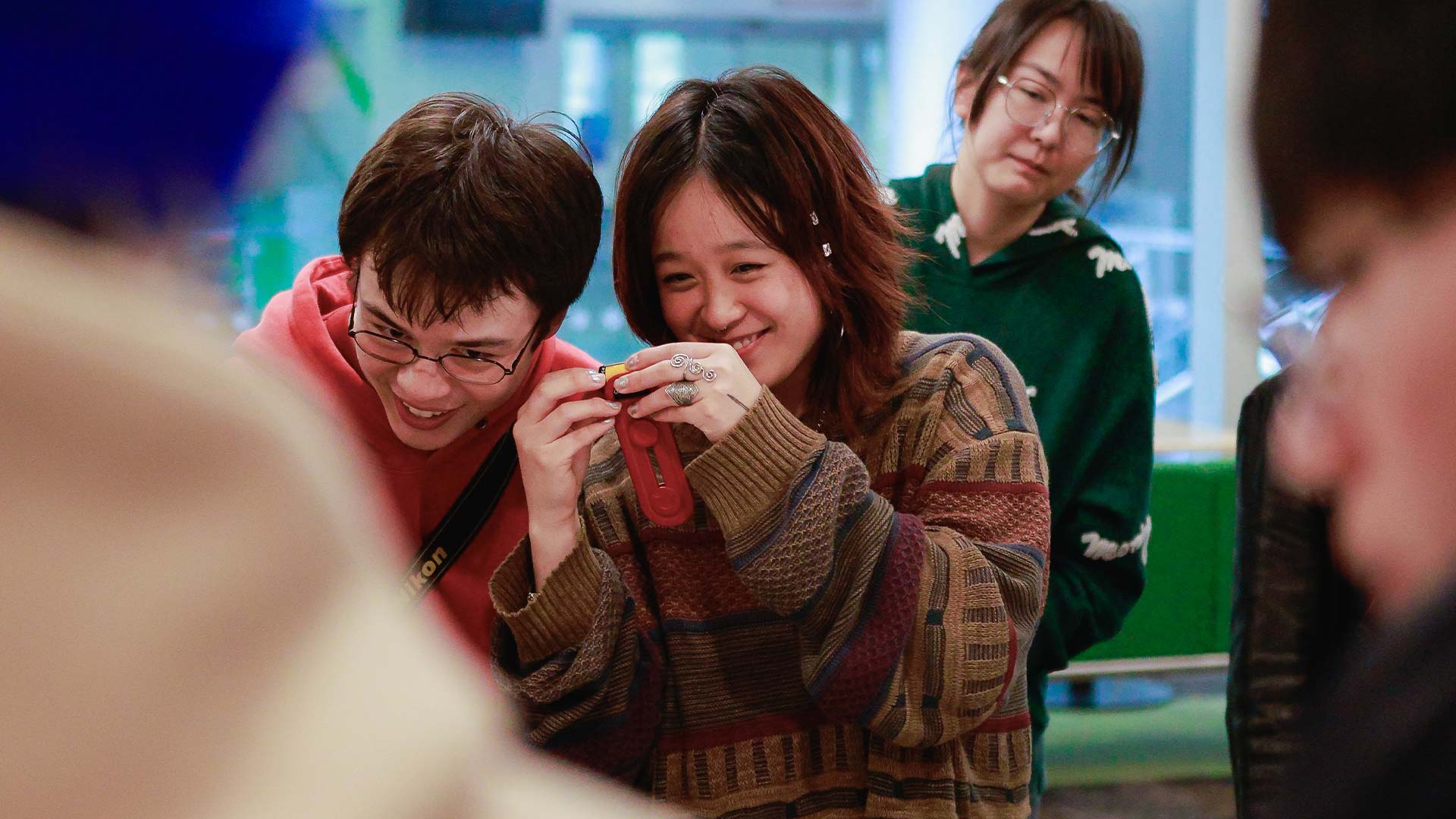 Two students smiling together